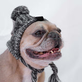 Bonnet en laine gris avec pompon