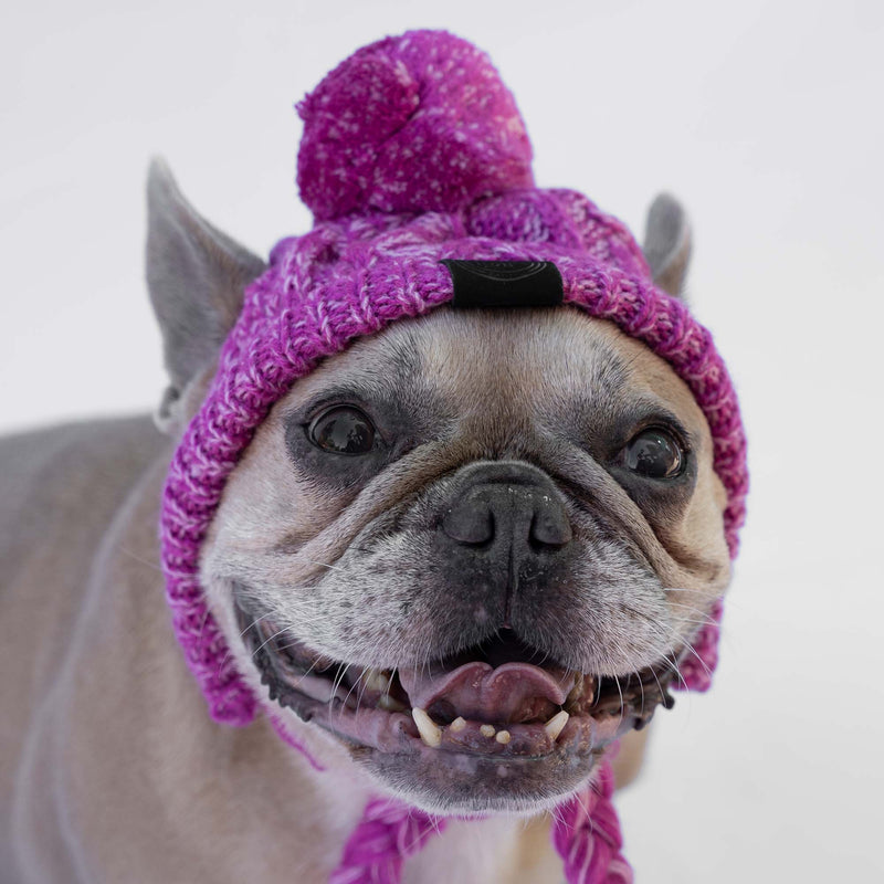 Chapeau en laine rose avec pompon