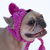 Chapeau en laine rose avec pompon